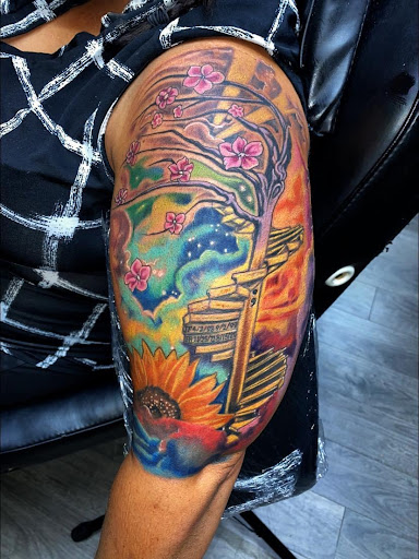 Explore upper back tattoo ideas for guys, creative tattoo ideas in Tampa, available at Creative Stain LLC