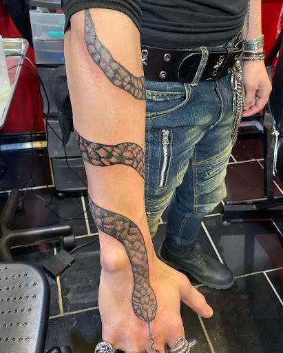 Explore minimalist dog tattoo ideas, creative tattoo ideas in Lexington, available at LexInk Tattoo