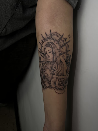 Explore black and white voodoo/ragdoll broken heart tattoo ideas, creative tattoo ideas in Wichita, available at PVI ICT TATTOO SHOP