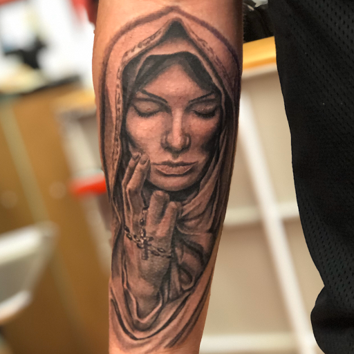 Explore spain tattoo ideas, creative tattoo ideas in Saint Joseph, available at Outlaw Ink
