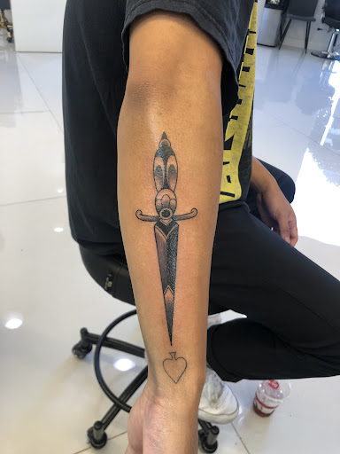 Explore family tree tattoo ideas for guys, creative tattoo ideas in Orange, available at Baron Art Tattoo