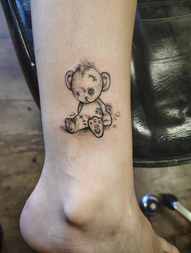 Explore totem pole tattoo ideas, creative tattoo ideas in Blackfoot, available at NightBreed Tattoos