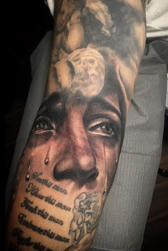 Explore male foot tattoo ideas, creative tattoo ideas in Kissimmee, available at Ol Skool Tattoos Studio