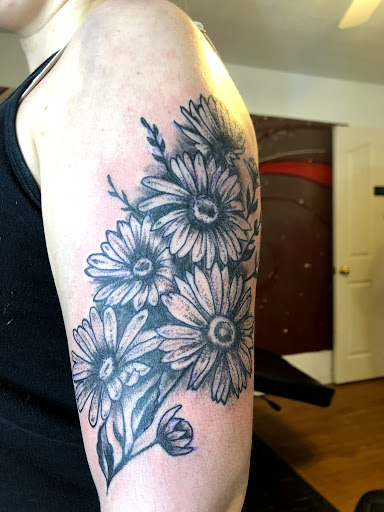 Explore hand tattoo ideas, creative tattoo ideas in Portland, available at Art Immortal Tattoo and Piercing