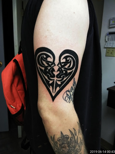 Explore name tattoo ideas for woman, creative tattoo ideas in Rockford, available at House Of Pain Tattoo co.