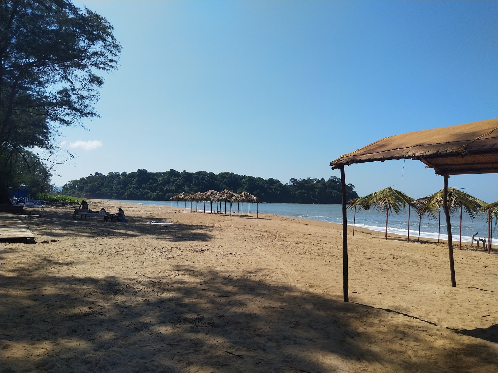 Foto van Rajbag Beach met beige zand oppervlakte