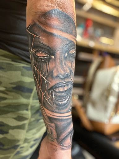 Explore tattoo ideas for parents, creative tattoo ideas in Sarasota, available at SEVEN SINS Tattoo Studio