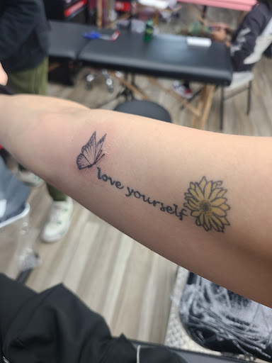 Explore hand tattoo ideas for men, creative tattoo ideas in Atlanta, available at Iron Palm Tattoos & Body Piercing Atlanta