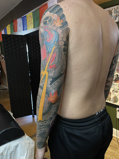 Explore neck tattoos for men ideas, creative tattoo ideas in North Charleston, available at Breakthrough Tattoo