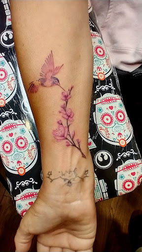 Explore girly half sleeve tattoo ideas for females, creative tattoo ideas in King Of Prussia, available at The Tattoo Parlour and Lounge