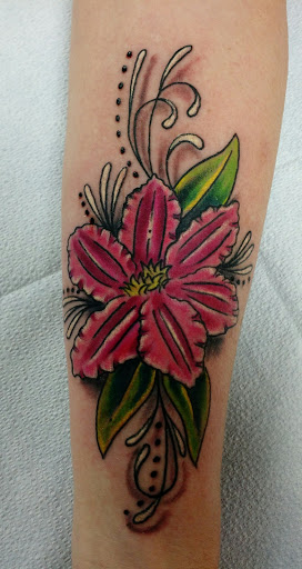 Find leo constellation tattoo ideas for your next unique tattoo in Black River Falls at Black River Tattoo