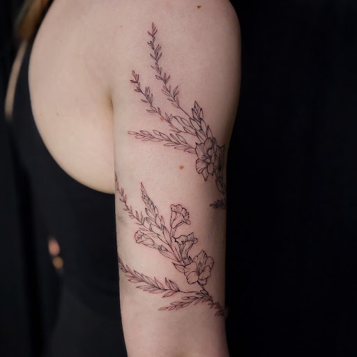 Find sakura tattoo ideas for your next unique tattoo in Minocqua at Whisky Rose Tattoo Parlor