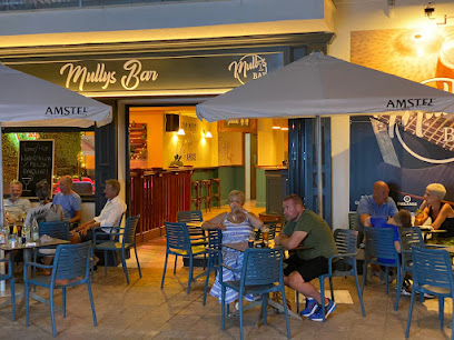 Mullys Bar - Carrer Atilio Boveri, 5, 07470 Port de Pollença, Illes Balears, Spain