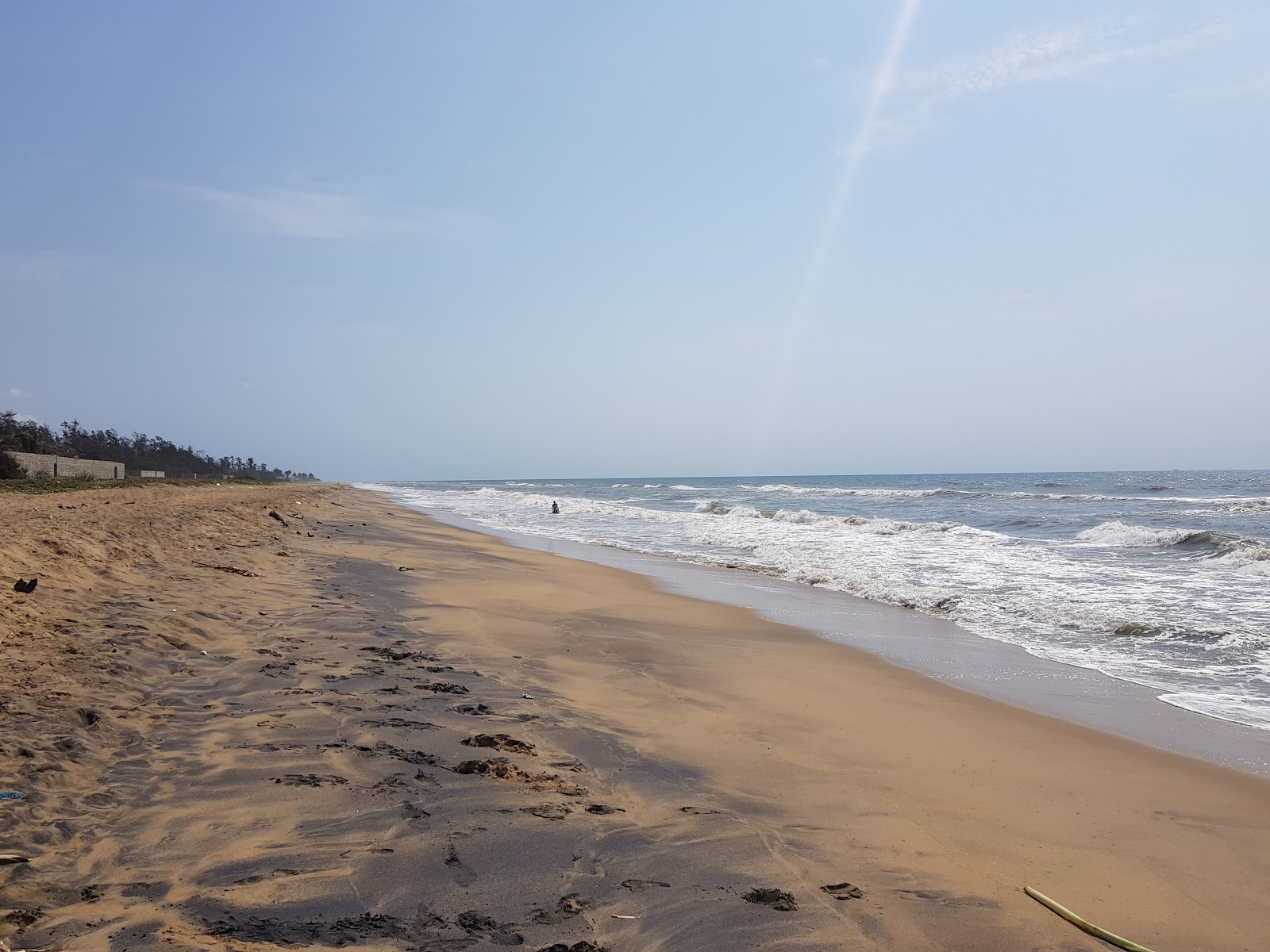 Vada Nemili Beach的照片 带有长直海岸