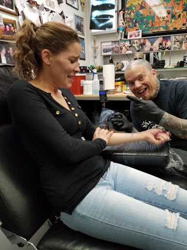 Explore female back tattoo ideas, creative tattoo ideas in Carson City, available at Skeleton Skin Tattoo