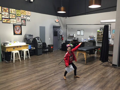 Explore hand tattoo ideas for man, creative tattoo ideas in Mount Juliet, available at Division Street Tattoo Company