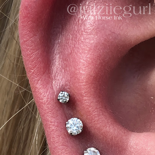 Explore hibiscus tattoo ideas, creative tattoo ideas in Kent, available at War Horse Ink