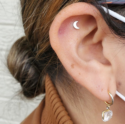 Find planet tattoo ideas for your next unique tattoo in Libertyville at Lucky Seven Tattoo