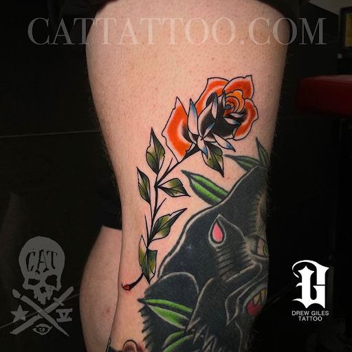 Explore leg tattoo idea for men, creative tattoo ideas in Addison, available at Cat Tattoo
