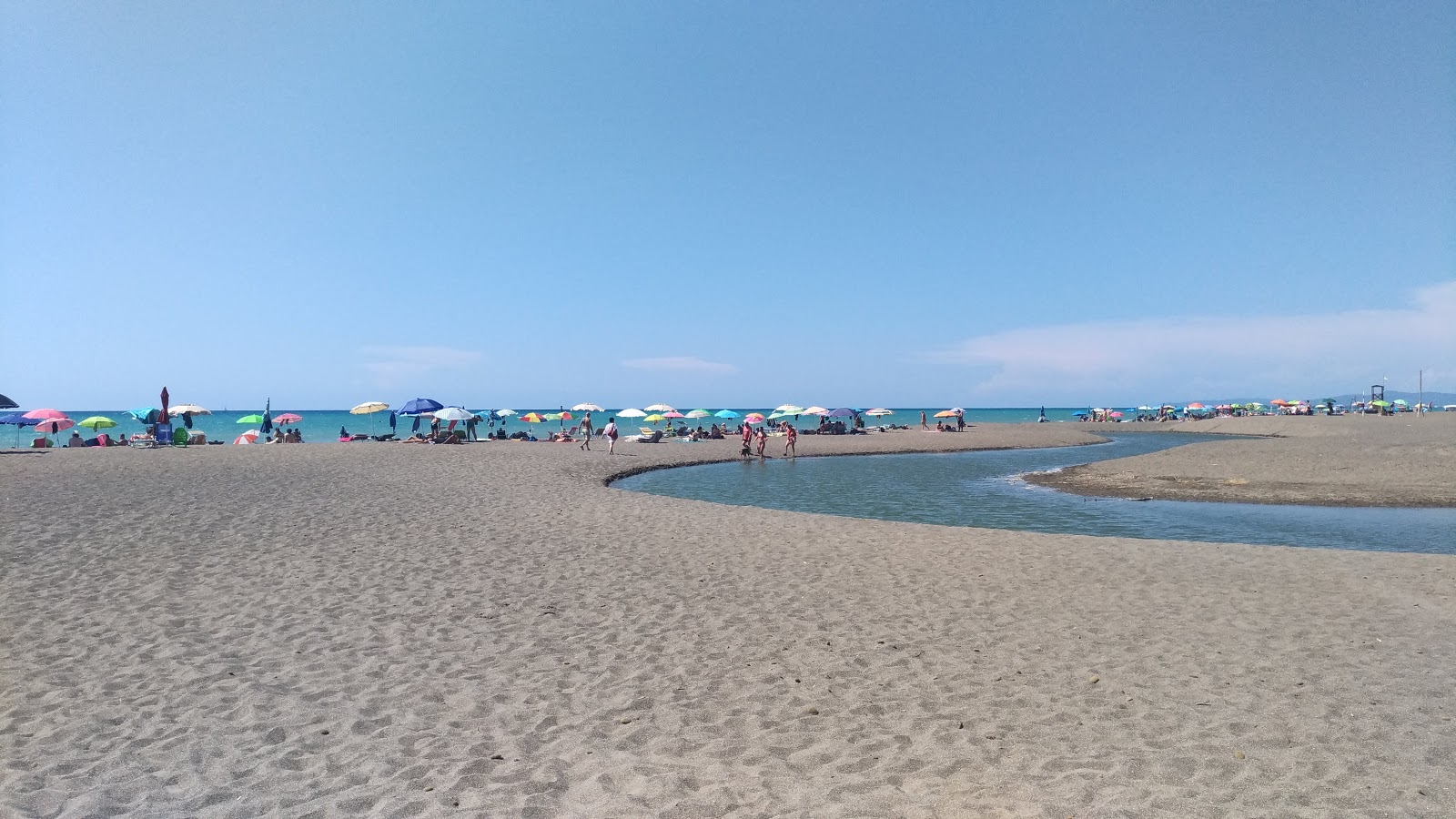 Etruria beach'in fotoğrafı - rahatlamayı sevenler arasında popüler bir yer