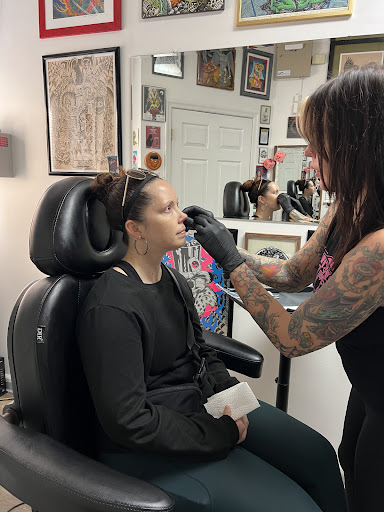 Explore saint tattoo ideas, creative tattoo ideas in Harrisonburg, available at Alley Cat Tattoo