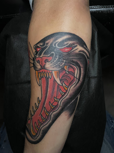 Explore finger tattoo ideas for guys, creative tattoo ideas in Edgewood, available at Wild Coyote Tattoo