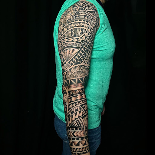 Explore ouroboros tattoo ideas, creative tattoo ideas in Chicago, available at Twisted Tattoo Studio