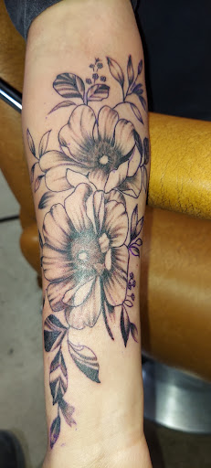 Explore bass guitar tattoo ideas, creative tattoo ideas in Odessa, available at Little Dragon Tattoos Studio