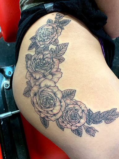 Explore insanity tattoo ideas, creative tattoo ideas in Charlottesville, available at Mystic Tattoo and Body Piercing