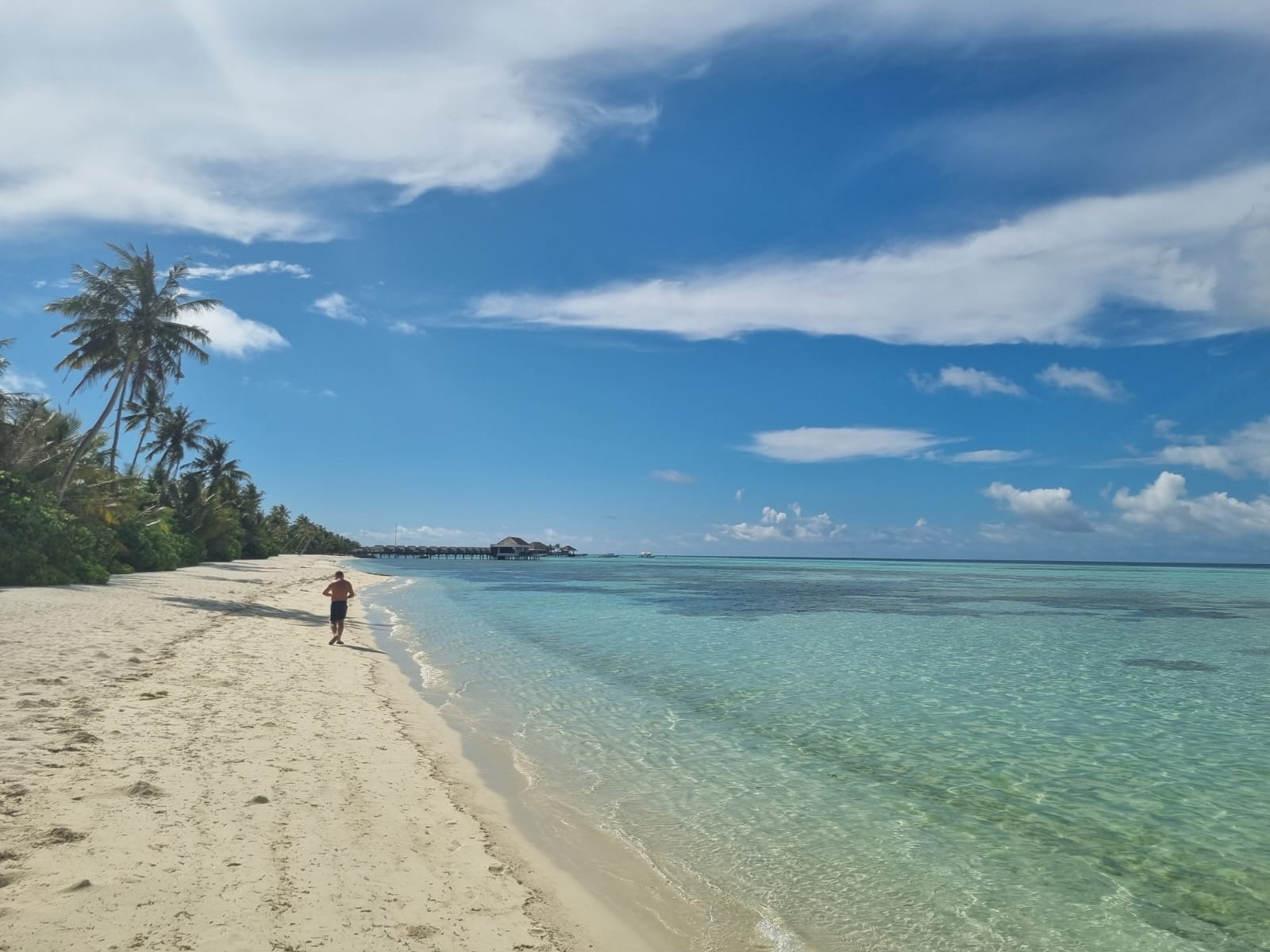 Foto von Pullman Resort Beach mit feiner weißer sand Oberfläche