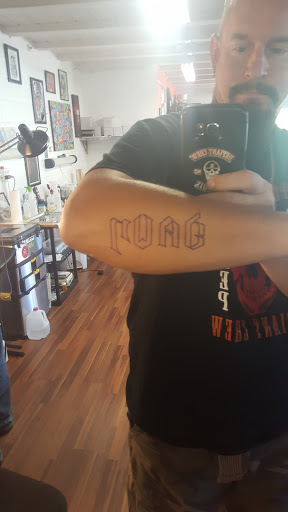 Explore cross tattoo ideas with meaning, creative tattoo ideas in Davenport, available at Unique Ink Art Studio