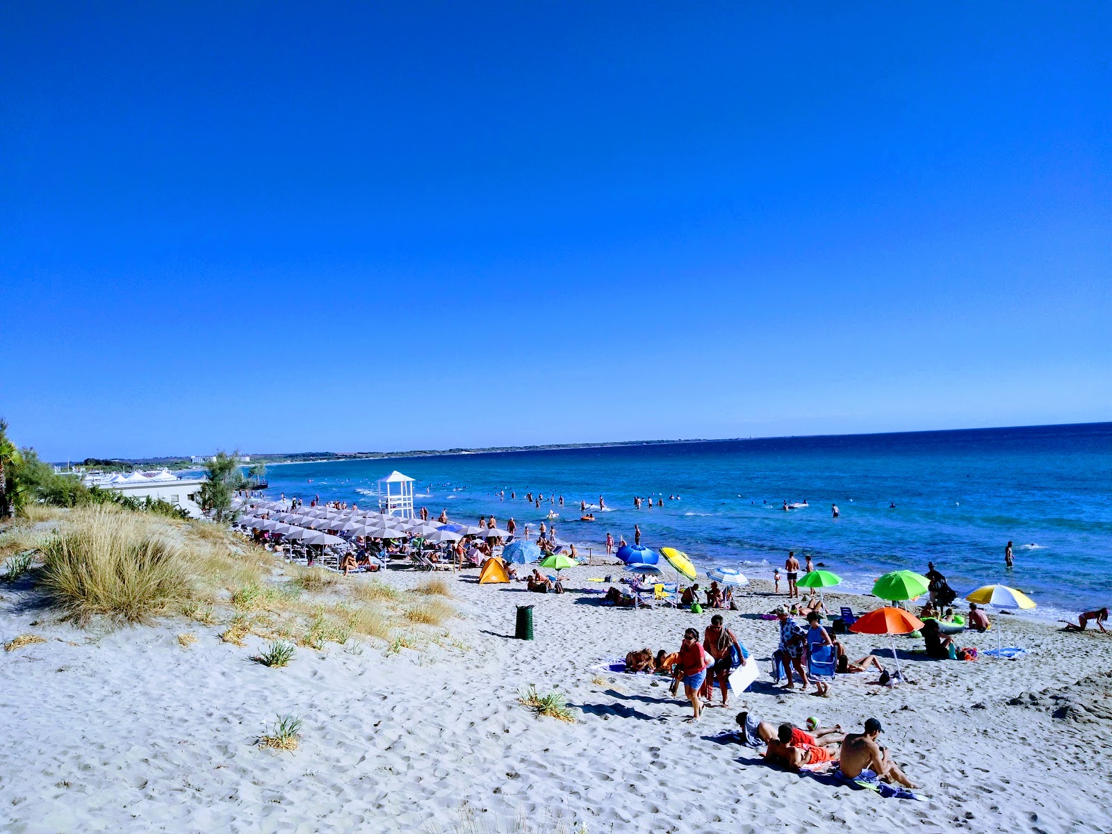 Spiaggia di Baia Verde'in fotoğrafı plaj tatil beldesi alanı