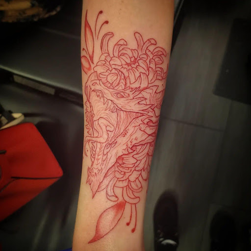 Find tattoo ideas moon and sun for your next unique tattoo in Palm Harbor at Angry Owl Tattoo and Piercing