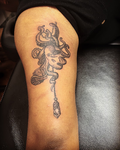 Explore baby footprint tattoo ideas, creative tattoo ideas in Cocoa, available at Rorschach Tattoo Shop and Piercing Studio