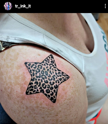 Explore tattoos on hand ideas, creative tattoo ideas in Benton, available at Spectrum Tattoo