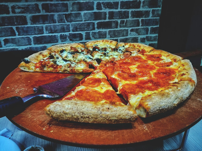 Opiniones de Pizzeria Papa Johns en Santo Domingo de los Colorados - Restaurante