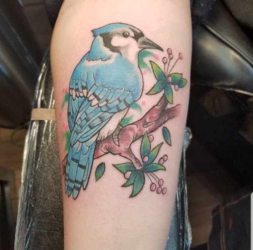 Explore caterpillar tattoo ideas, creative tattoo ideas in Sioux Falls, available at Permanent Addictions