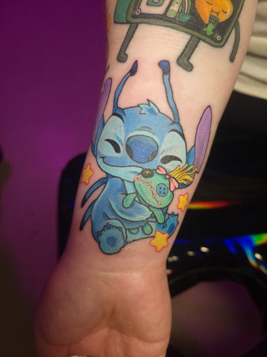 Explore black men tattoo ideas, creative tattoo ideas in Manchester, available at Sacred Heart Tattoos