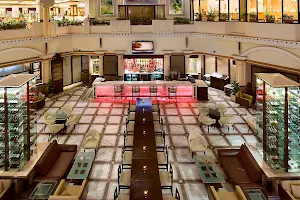 The Atrium Bar & Lounge - The Suryaa Hotels image