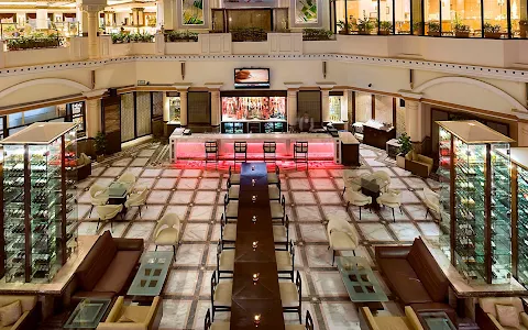 The Atrium Bar & Lounge - The Suryaa Hotels image