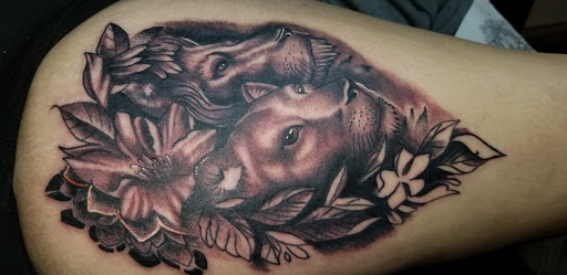 Explore mom dad tattoo ideas, creative tattoo ideas in Angola, available at Hoodlum Ink