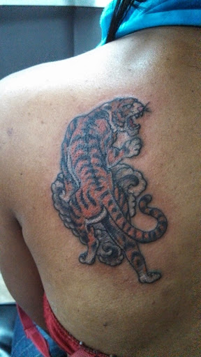 Explore name cover up tattoo ideas, creative tattoo ideas in Charlotte, available at Tattoo Bills Charlotte