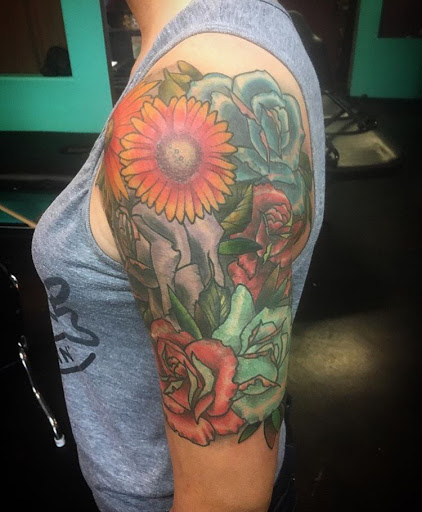 Find tattoo ideas for upper arm men for your next unique tattoo in San Diego at Sideshow Tattoo and Piercing