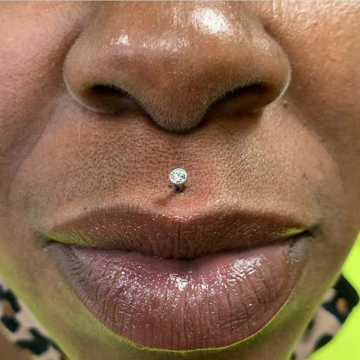 Explore male forearm tattoo ideas, creative tattoo ideas in Summerville, available at Exotic Impressions Body Piercing