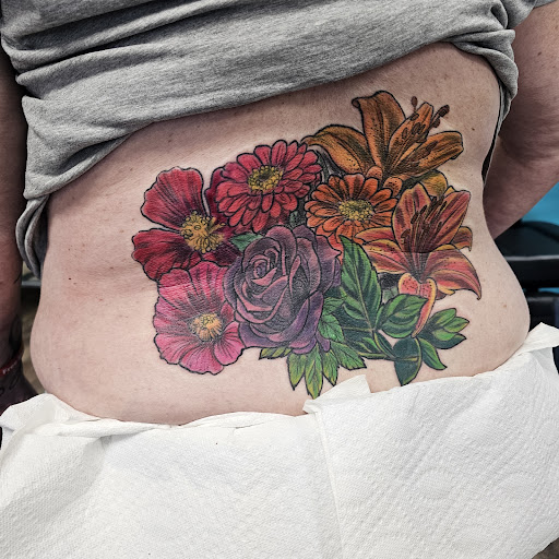 Explore colour tattoo sleeve ideas, creative tattoo ideas in Traverse City, available at Pinups & Needles