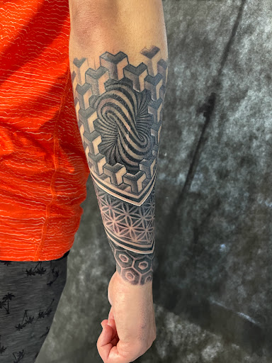 Explore shin tattoo ideas female, creative tattoo ideas in Sarasota, available at SEVEN SINS Tattoo Studio