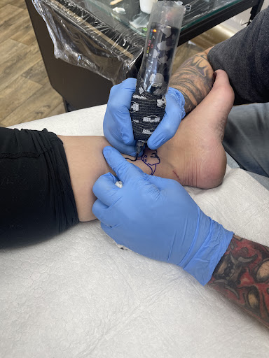 Explore two sons tattoo ideas, creative tattoo ideas in Clovis, available at Ronster Tattoo Studios