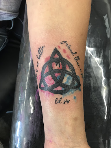 Explore women arm tattoo ideas, creative tattoo ideas in Erie, available at 76 Tattoo