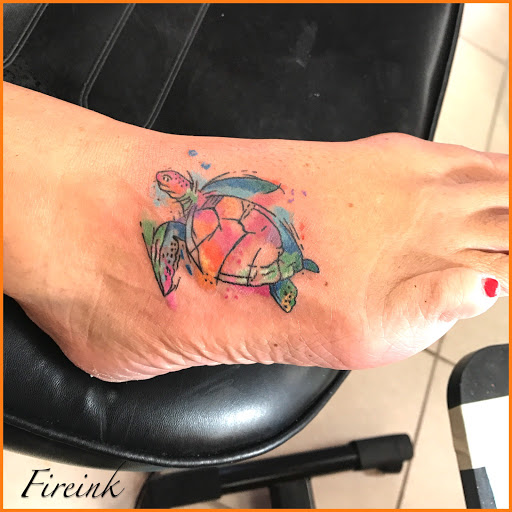 Explore male inner bicep tattoo ideas, creative tattoo ideas in Key Largo, available at Fire Ink Tattoo