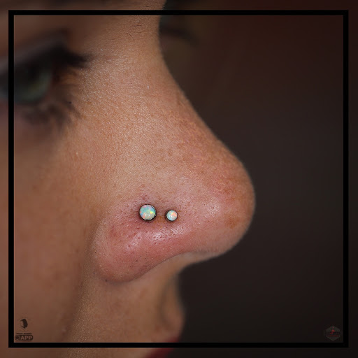 Find biohazard tattoo ideas for your next unique tattoo in Brainerd at Red at Night Tattoos and Piercings